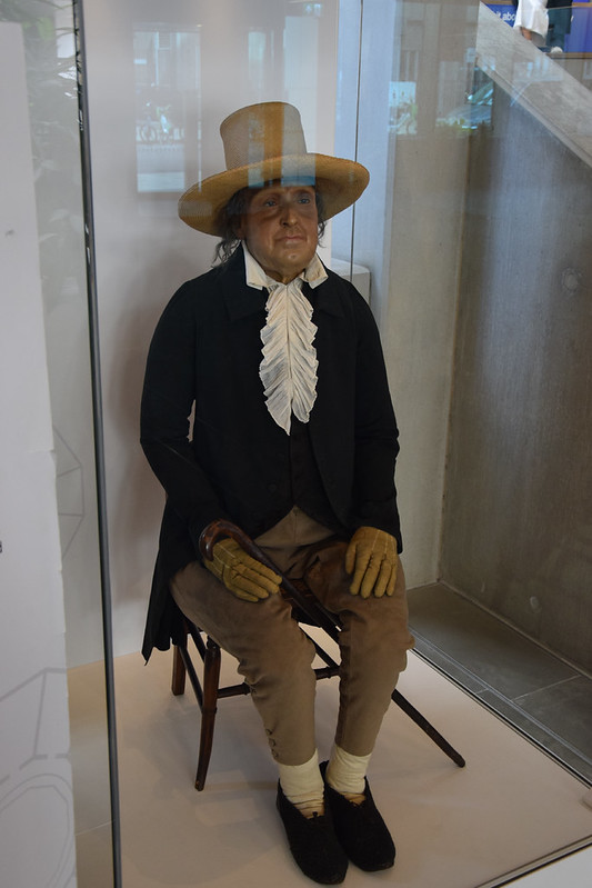 Auto-icon of Jeremy Bentham displayed in a glass case at University College London